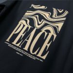 Футболка з принтом - Peace оверсайз чорна