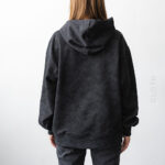 чорне худі варенка з написом All we need is God